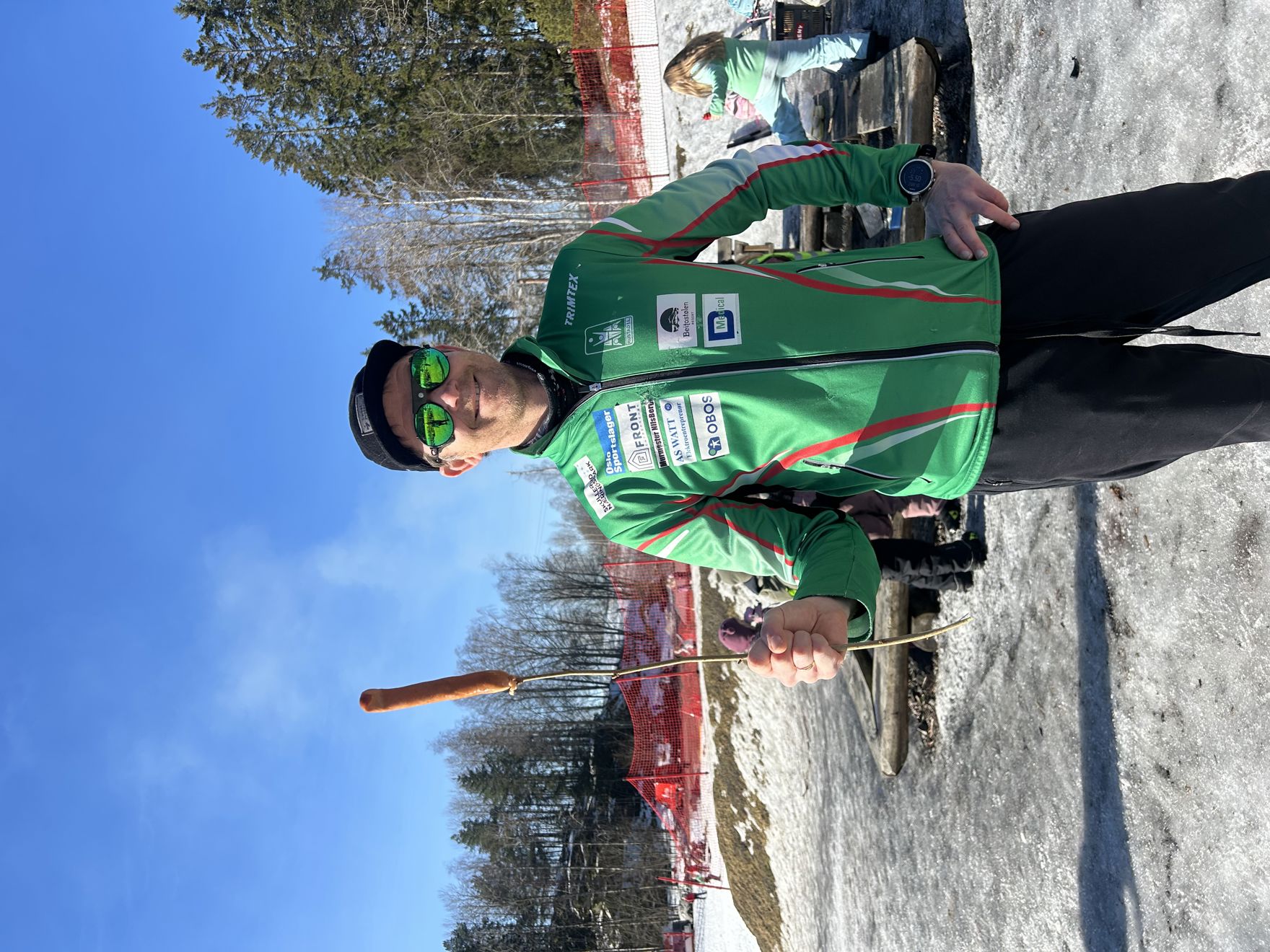 en person i grønn uniform